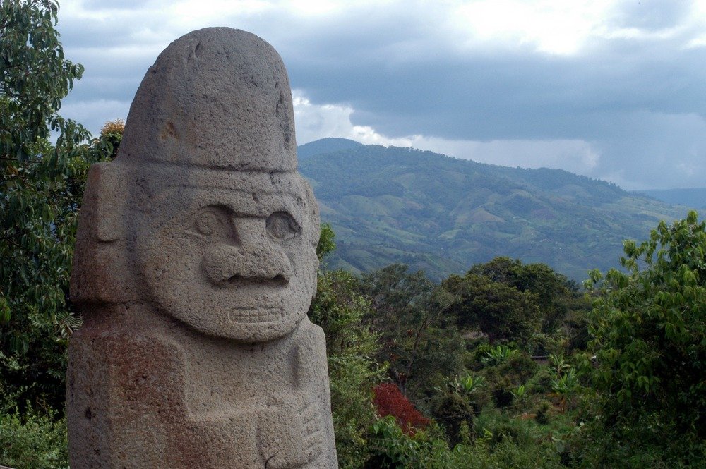 pre-columbian statue in mountains surrounding San Agustin