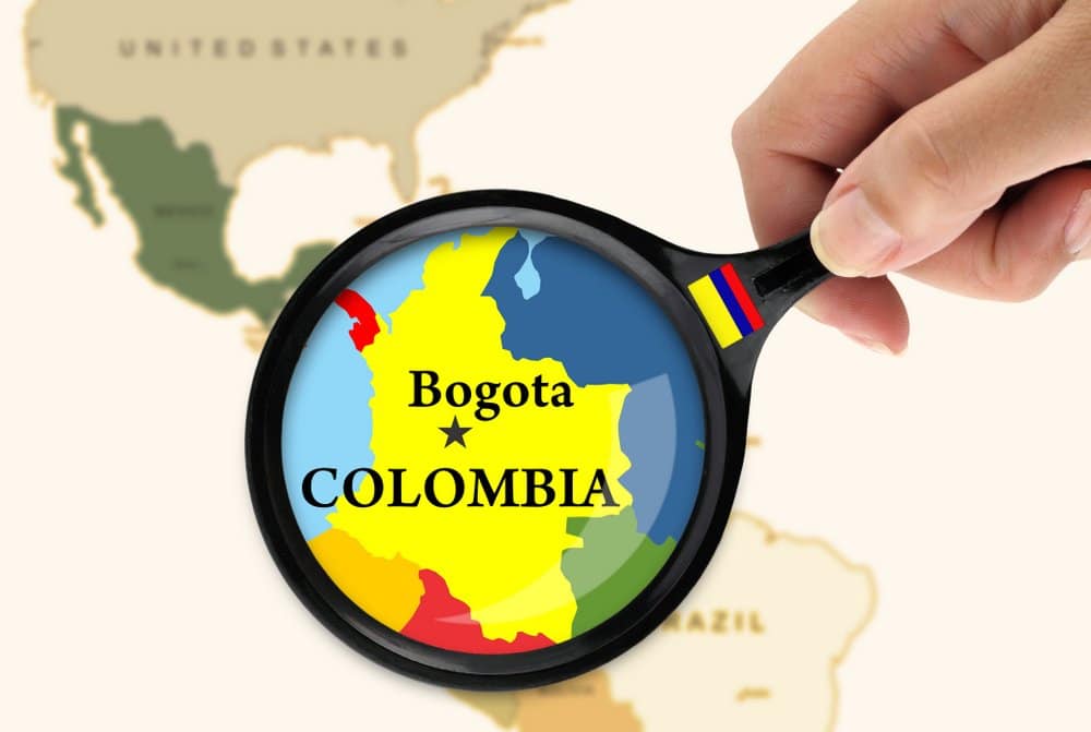 Colombia on map under magnifying glass