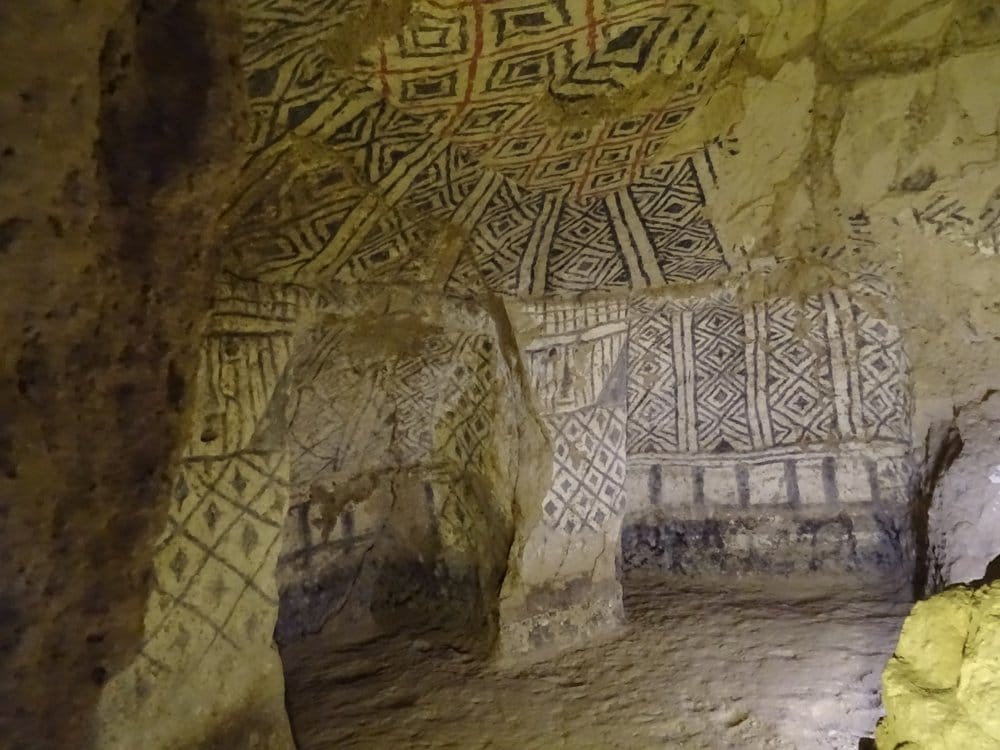 Interior of a decorated tomb in Tierradentro