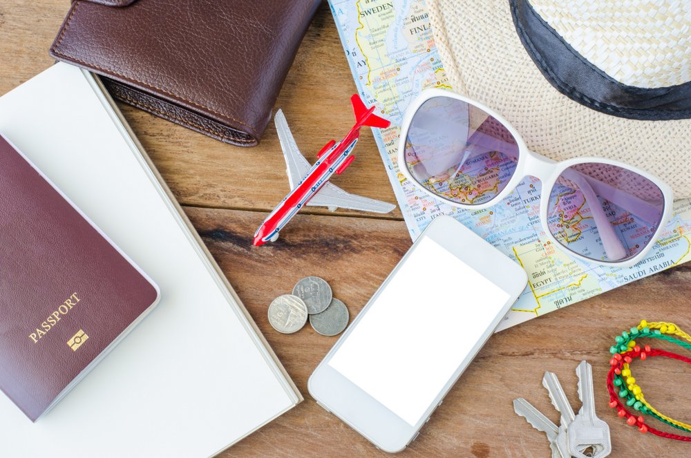 Passport glasses cellphone to plan trip