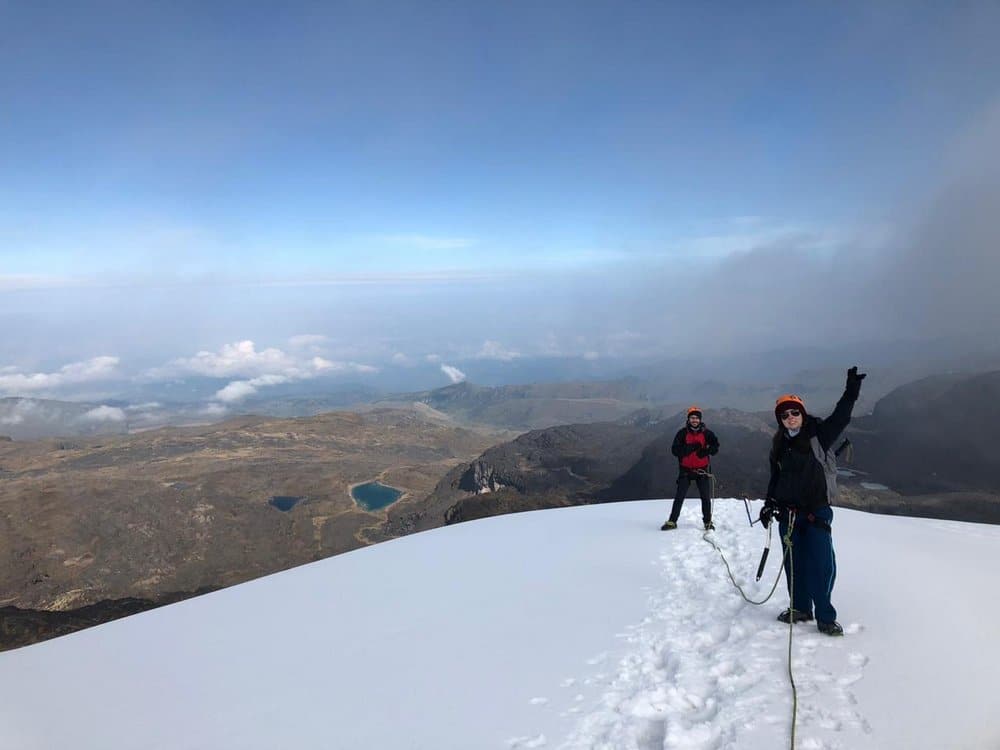 Tourists posing on snow