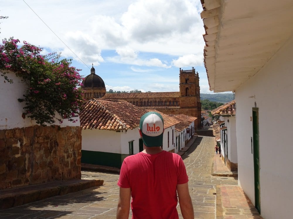 Tourist walking the streets of colonial Barichara